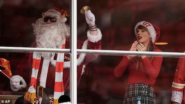 Taylor Swift screams her support for boyfriend Travis Kelce while wearing a Christmas hat with his jersey number on at Arrowhead... after jetting in to Kansas City from Nashville with her mom and dad