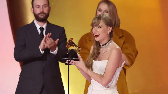 Taylor Swift’s “Midnights” took home the big award at the 2024 Grammys on Sunday night as she set the record for most Album of the Year wins by a single artist.