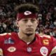 New footage shows Patrick Mahomes' shocked reaction to the 49ers' coin toss decision at Super Bowl LVIII before quarterback runs back to Travis Kelce and the Chiefs in disbelief