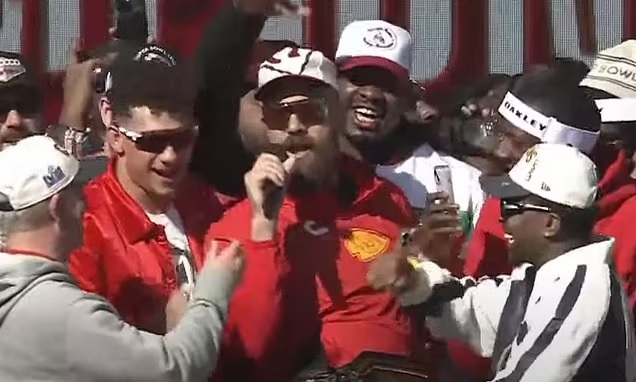 Travis Kelce got too drunk to SPEAK and has to be held up by his teammates on stage at Kansas