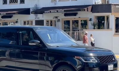 Travis Kelce is spotted hitching a ride to Taylor Swift's $25m Beverly Hills mansion - as superstar couple enjoy more time together after attending glitzy Oscars bash on Sunday night